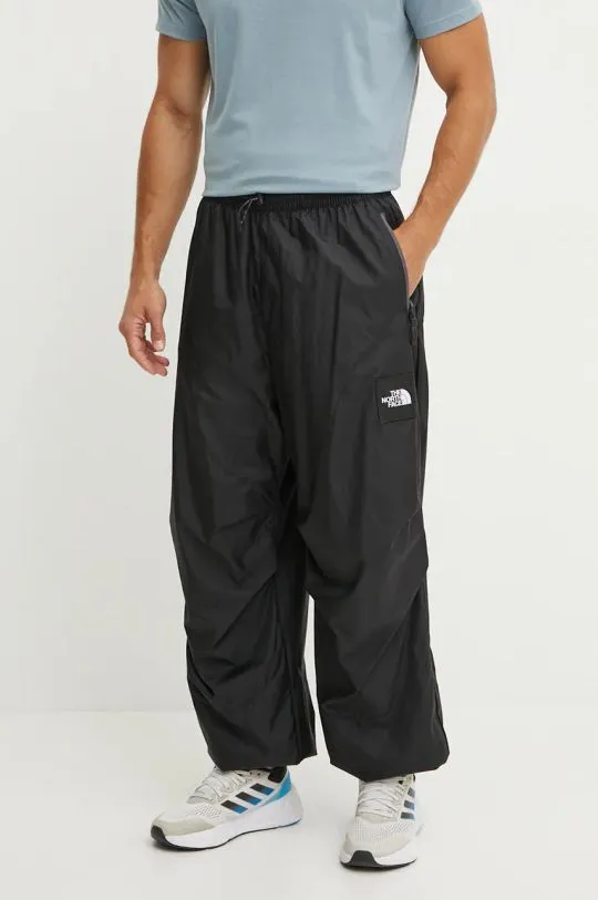 The North Face trousers TNF x Yinka Ilori black color with an application NF0A89GPJK31